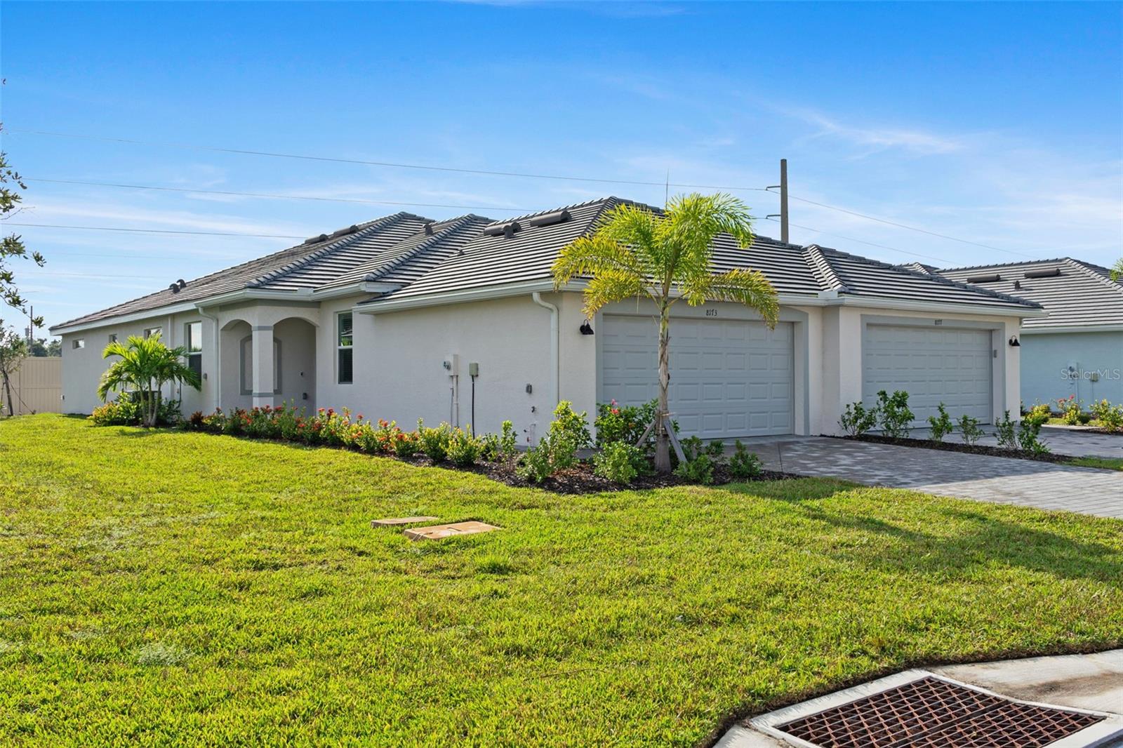 One or more photo(s) has been virtually staged. Welcome to the Orchid villa in Palm Lake at Coco Bay, a premier gated community in Englewood. This beautifully designed 2 bedroom + den, 2 bath home offers 1,564 sq ft under air with an open-concept layout perfect for modern living. The kitchen features sleek cabinetry, solid-surface counters, and a spacious island overlooking the dining and great room, ideal for both entertaining and everyday life. The primary suite includes a private bath with dual vanities and a walk-in closet, while the second bedroom and full bath provide comfort for guests. A versatile den can serve as a home office or flex space.
Enjoy Florida living outdoors on the covered lanai, or relax inside with peace of mind knowing the home is equipped with impact windows, a tile roof, and a 2-car garage.
Palm Lake at Coco Bay residents enjoy resort-style amenities including a sparkling pool, clubhouse, fitness center, and playground. Lawn maintenance is included, offering a true low-maintenance lifestyle. Conveniently located near Gulf beaches, golf, shopping, dining, and medical facilities.
Whether you’re seeking a year-round residence or a seasonal retreat, this move-in ready villa delivers comfort, style, and community.