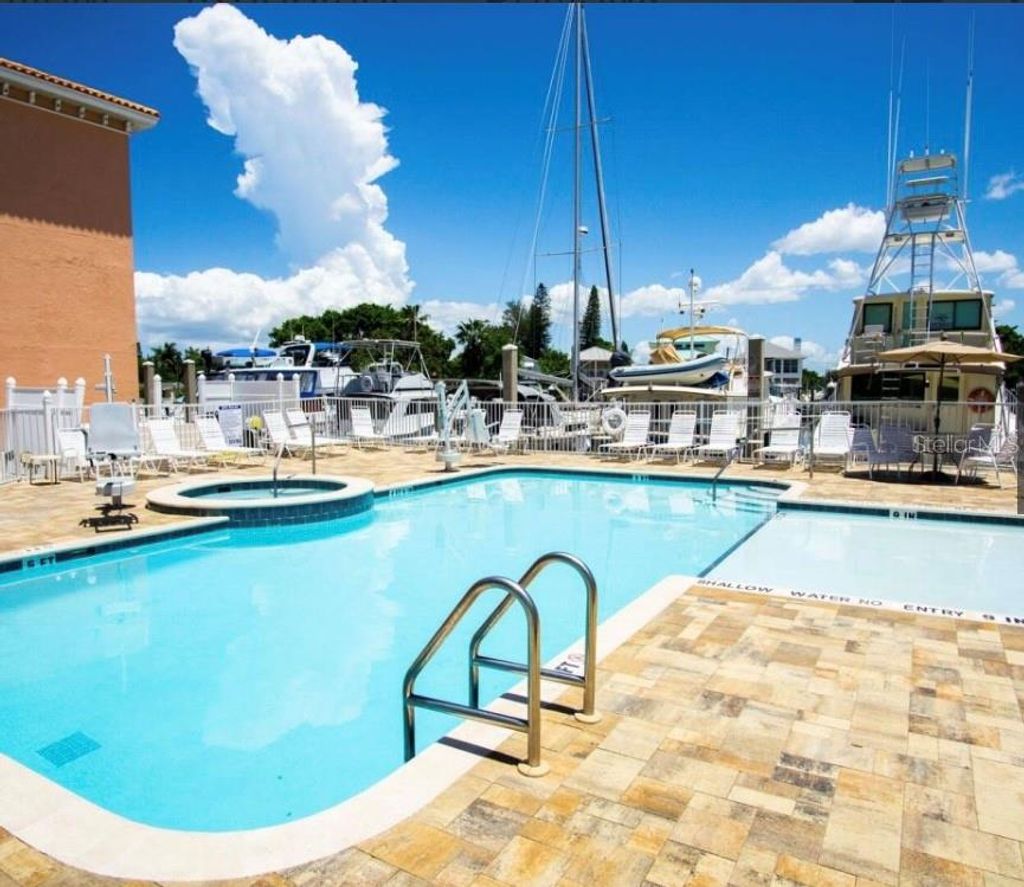 Photo of 13235 Gulf Boulevard #315, Madeira Beach, FL 33708 (MLS # TB8444327)