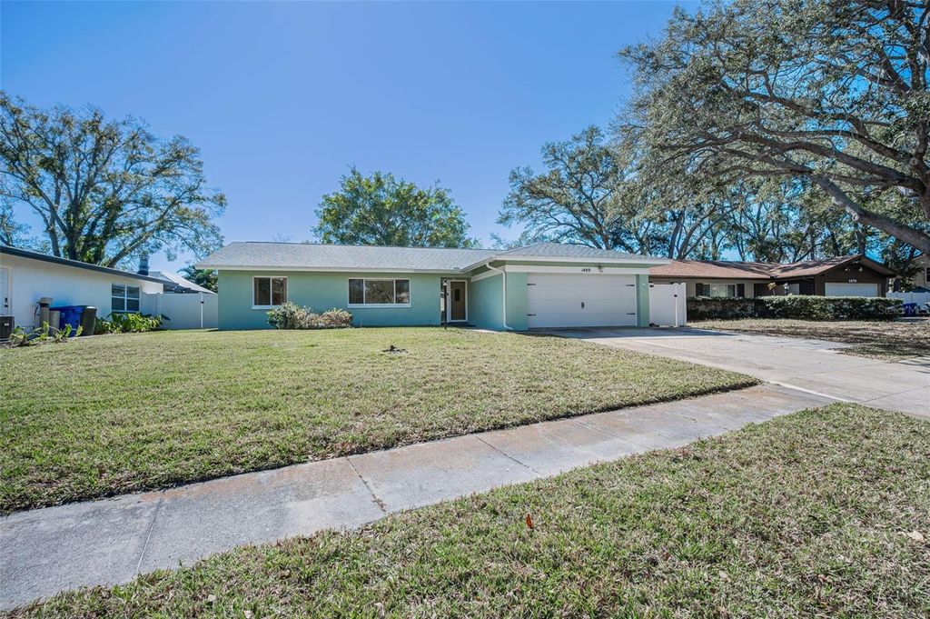 Photo of 1489 Coachlight Way, Dunedin, FL 34698 (MLS # TB8473840)