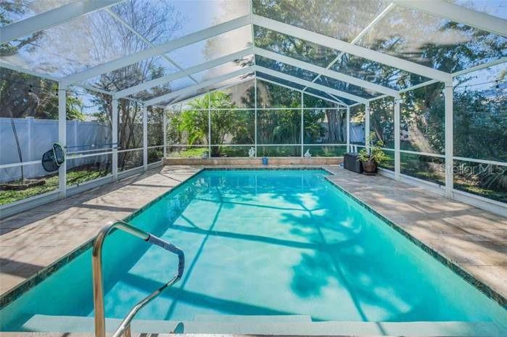 Photo of 1489 Coachlight Way, Dunedin, FL 34698 (MLS # TB8473840)