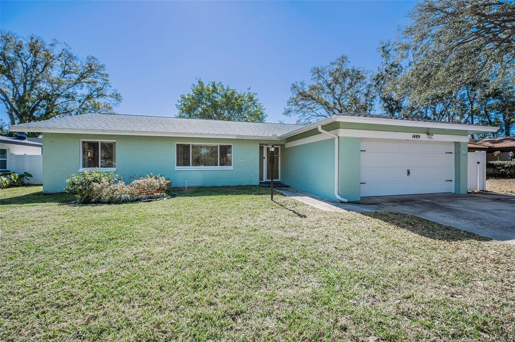 Photo of 1489 Coachlight Way, Dunedin, FL 34698 (MLS # TB8473840)
