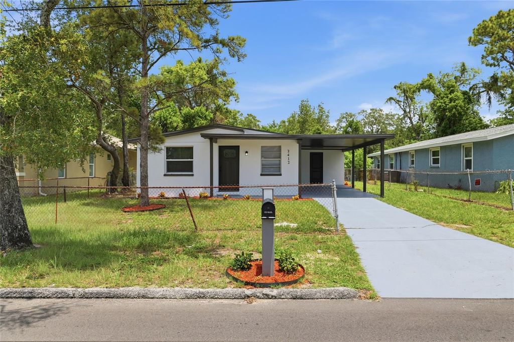 Photo of 3412 E Henry Avenue, Tampa, FL 33610 (MLS # TB8528652)