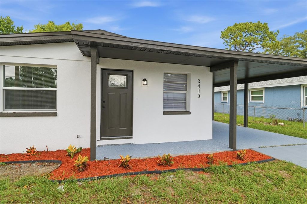 Photo of 3412 E Henry Avenue, Tampa, FL 33610 (MLS # TB8528652)