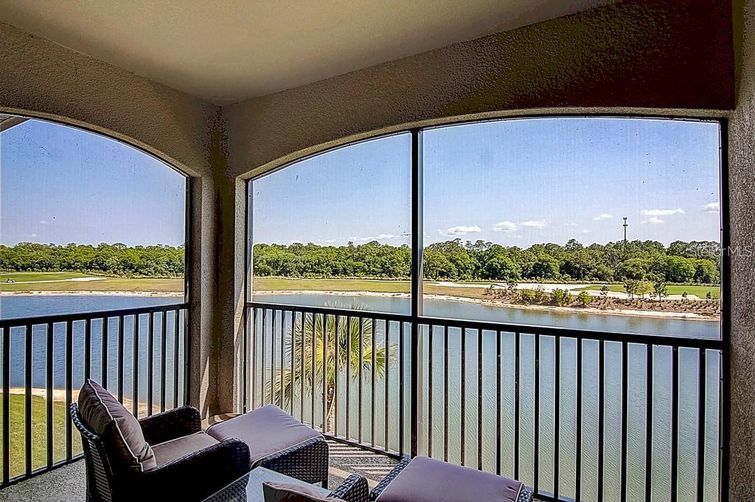 TOP FLOOR+++THE BEST VIEWS IN LAKEWOOD NATIONAL! +++++ available starting June 1, 2025. AMENITIES ARE NOT INCLUDED other than the satellite pool in between the condo buildings. This top floor 4th floor is available as UNFURNISHED or TURNKEY FURNISHED as an ANNUAL rental only. Elevator access to the top floor and the OUTSTANDING views of the lake, golf course and trees. The main bedroom has a king size bed and the 2nd bedroom has a queen bed. This unit also comes with a reserved carport parking spot. Lakewood Ranch has numerous restaurants and shopping available close by. Our amazing beaches and downtown Sarasota and Bradenton are 20-30 minutes away. First and last month's rent and security deposit required.