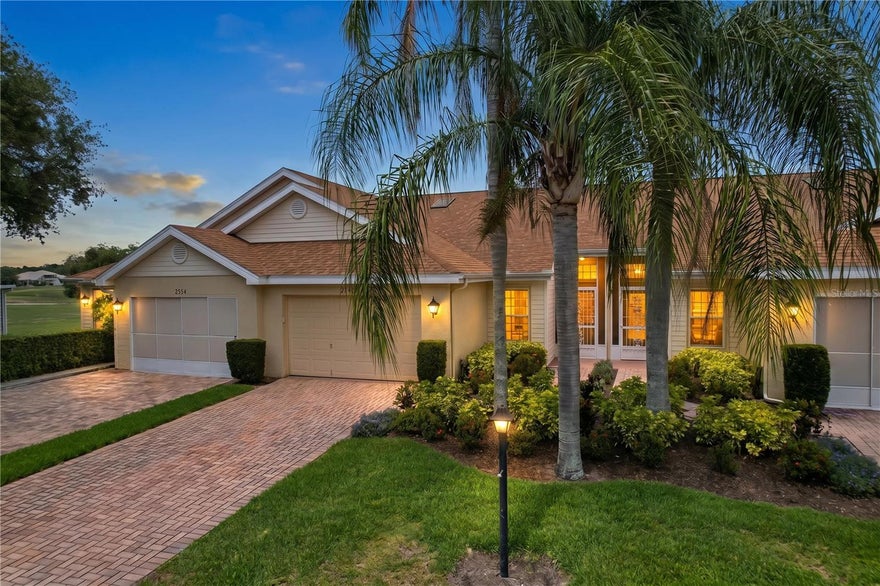 Welcome to peaceful waterfront living in the highly sought after Kings Point community of Sun City Center, where maintenance-free living, resort-style amenities, and golf cart accessibility create the perfect over 55 Florida lifestyle. Perfectly positioned on a quiet cul-de-sac with tranquil pond and conservation views, this beautifully updated Concord floor plan offers the rare combination of privacy, natural beauty, and modern interior updates. From the moment you enter, you’ll notice the bright, open feel created by vaulted ceilings, abundant natural light, and expansive rear windows that showcase the serene setting beyond. This home underwent a complete renovation in 2025, featuring luxury vinyl plank flooring throughout, fresh Sherwin Williams interior paint, scraped and refinished ceilings, updated ceiling fans and light fixtures, and custom shiplap accent details that add warmth and character to the home. The kitchen has been tastefully updated with quartz countertops, tile backsplash, undermount sink, stainless steel appliances (counter depth refrigerator), sliders in lower cabinets for easy access, and breakfast bar seating that opens seamlessly to the main living area - ideal for both everyday living and entertaining. One of the home’s standout features is the spacious Florida room, where panoramic water and conservation views create a peaceful backdrop year-round. Whether enjoying morning coffee while watching the sunrise and wildlife over the water or unwinding at the end of the day, this space truly captures the beauty of Florida living. The split-bedroom floor plan offers privacy for owners and guests alike. The spacious primary suite accommodates king-size furniture with ease and features a walk-in closet along with an updated en-suite bathroom offering stone countertops, newer vanity, and walk-in shower with glass enclosure. The guest bathroom has also been updated with a new vanity and tub/shower surround. Additional highlights include inside laundry, updated plumbing and electrical, an extended paved driveway, covered breezeway entry, and a 1.5 car garage with room for both a vehicle and golf cart. This home comes with a 13 month home warranty for buyer’s Peace of Mind and to help make transitioning easier! Kings Point residents enjoy access to indoor and outdoor heated pools, pickleball, fitness centers, cafés, restaurants, salon services, clubs, social activities, security, and more. Monthly fees include roof repair/replacement, exterior painting, cable, internet, exterior insurance, grounds maintenance, water, sewer, trash, pest control, and more. Conveniently located near Tampa International Airport, Sarasota, Gulf beaches, and Ellenton Premium Outlets. Beautifully updated and surrounded by nature, this is the kind of peaceful Florida retreat buyers dream about. Room sizes are approximate – Buyer must verify.  PLEASE CLICK VIRTUAL TOUR LINK.