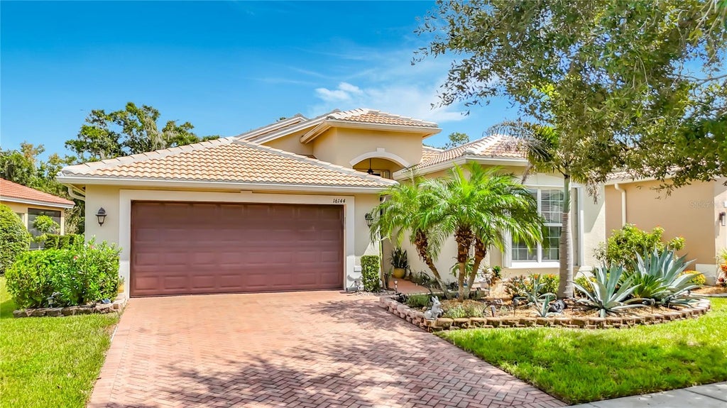 Photo of 16144 Coquina Bay Lane, Wimauma, FL 33598 (MLS # O6445542)