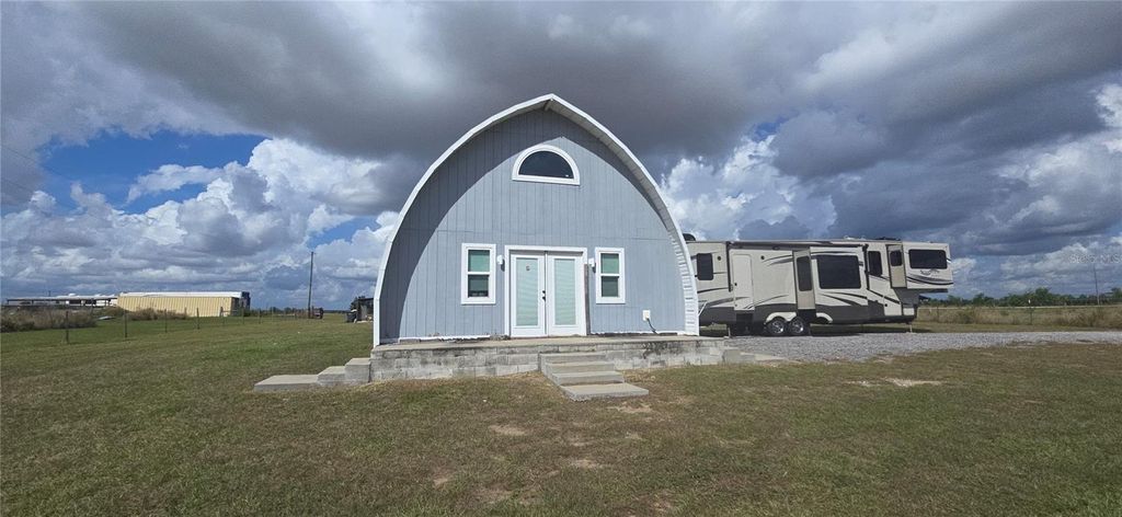 Photo of 206 Lake Ida Rd, Frostproof, FL 33843 (MLS # K4903116)