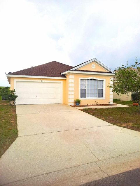 Photo of 705 Rollins Drive, Davenport, FL 33837 (MLS # G5102710)