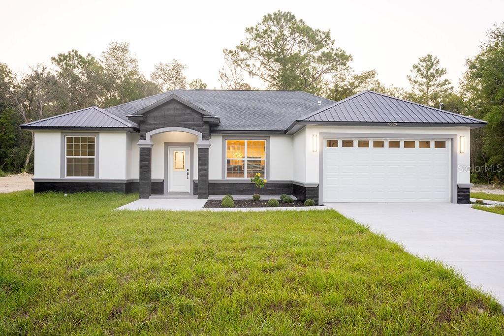 New Construction - Completed 4BR/3BA 1 Acre No HOA Rolling Hills Brand new construction in the desirable Rolling
Hills subdivision! This beautifully
designed 4-bedroom, 3-bath home features an open floor plan with high ceilings and upgraded finishes
throughout. Enjoy the comfort of two
primary suites, perfect for extended family or guests. The spacious living area includes an electric fireplace,
creating a warm and inviting
atmosphere that flows seamlessly into the modern kitchen and dining space. Situated on a 1-acre corner lot
with no HOA, this property offers
privacy and flexibility. Located just minutes from I-75, the World Equestrian Center, shopping, dining, and
medical facilities in Ocala. More Phots
will be posted soon Finale touches are being completed Move-in ready with space, style, and
convenience?schedule your showing today!