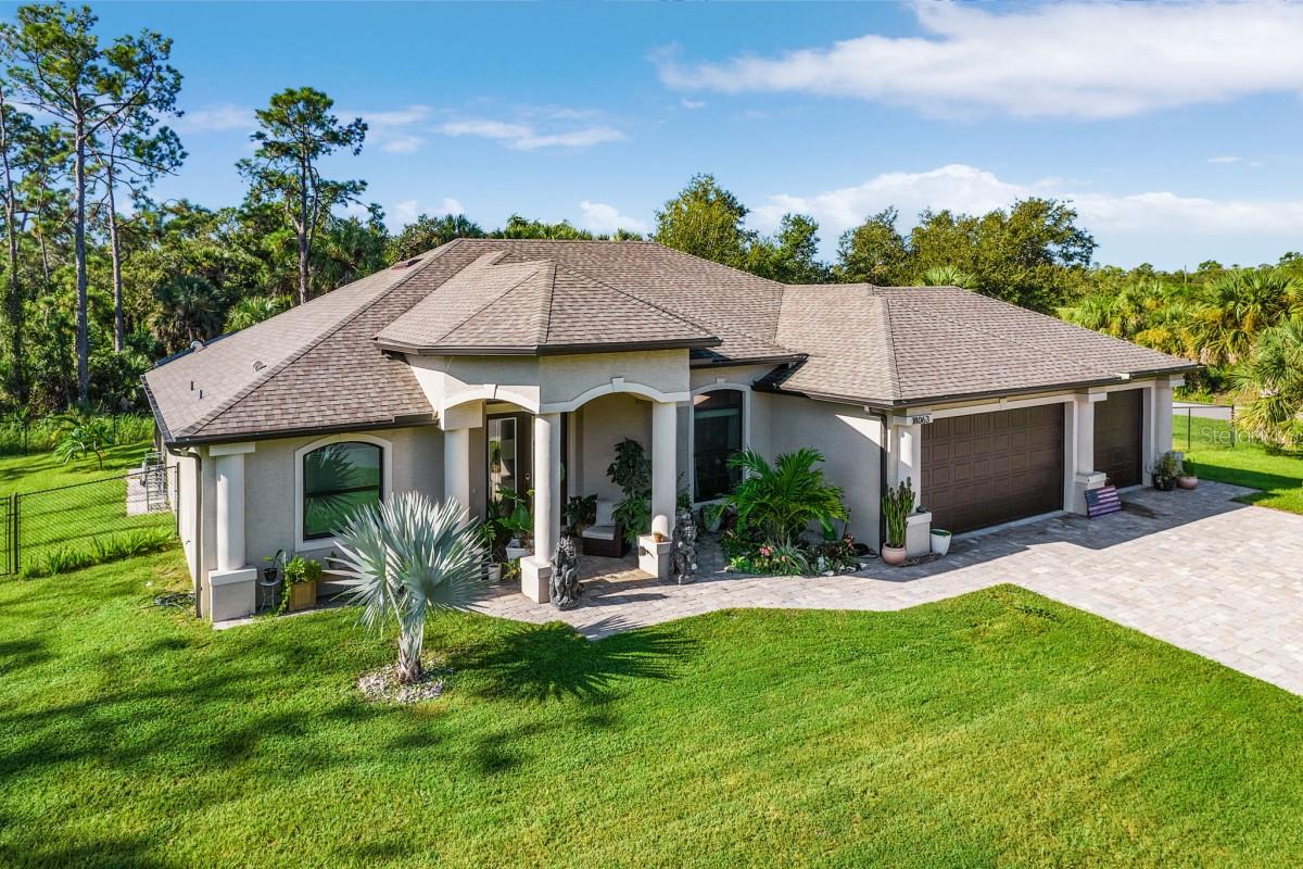 Welcome to your own private resort-style retreat! This 2024 custom-built home offers 4 bedrooms, 2 baths, and 2,070 sq. ft. of living space on a rare double lot in a peaceful, tranquil setting adjacent to a pond. Designed with luxury and comfort in mind, this fully furnished property is move-in ready and loaded with upgrades.
Step inside and enjoy a bright, open floor plan with crown molding, LED rope lighting, and a multi-zone surround sound system with receiver. The chef’s kitchen is a true showpiece with quartz countertops, a large kitchen island, modern appliances, a spacious pantry, and double-decker cabinets, while the primary suite offers a spa-like bath with a soaking jacuzzi tub and a large walk-in closet.
Outdoor living is unparalleled with a heated swimming pool featuring LED lighting, a pool cage, hot tub, paved lanai, and a built-in gas BBQ system connected to a 500-gallon propane tank. Additional highlights include an outdoor shower, butterfly garden, and underground gutter system.
This home is equipped with everything for convenience and peace of mind:
3-car garage
App-controlled pool and sound systems
Central house vacuum
Reverse osmosis system
Security system
Sprinkler system
Built-in gas generator
Pool cage
Fence
Located just minutes from beaches and outdoor adventures, including kayaking and boating on the Peace River, this property is perfect for those seeking luxury, privacy, and Florida living at its best.
Don’t miss this one-of-a-kind opportunity.