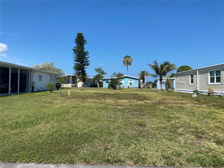 Welcome Harbor Cove Community located in North Port FL! This cleared lot is ready for a new home. Harbor Cove boasts an array of amenities to elevate your lifestyle, including a boat ramp, a 90-slip marina, a two-story clubhouse, two heated pools, a hot tub, bocce, tennis, fitness facilities, a woodworking shop, crafts, storage grounds, and more. For the avid golfer, there's a different golf course to play every day of the week. The community is ideally situated for easy commutes to Sarasota and Fort Myers, and is just minutes away from Gulf beaches, the Myakka River, Charlotte Harbor, numerous restaurants, shopping centers, the Tampa Bay Rays' spring training stadium, Warm Mineral Springs, Cool Today Stadium for the Atlanta Braves, and the Allegiant Airlines SunSeeker Resort in Charlotte Harbor. Don't miss out on this fantastic building lot in an unbeatable location—come check it out today!