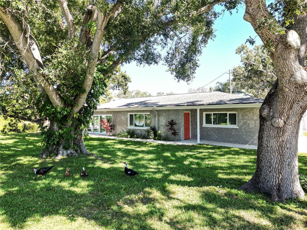 Photo of 10517 Blossom Lake Drive, Seminole, FL 33772 (MLS # TB8432034)