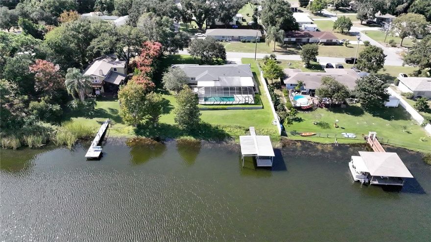 Enjoy true Florida lakefront living in this well maintained 3 bedroom 3 bathroom pool home. Lake Buckeye is ideal for water skiers, kayakers, fishermen or people that just love the serenity and wildlife viewing opportunities that waterfront living affords. Enjoy the antics of the Sandhill Cranes, Kingfishers, Osprey and bunnies to name just a few.
NEW ROOF IN 2024!!
New high quality, energy, efficient windows, and front door in 2024.
The sunrise views across the lake are gorgeous!

Other upgrades include a quality kitchen with Kraftmaid cabinets, granite counters and stainless appliances, windows and sliding doors with hurricane protection panels and an irrigation system that draws from the lake.
Lake Buckeye does feature a boat ramp so it's easy to get your boat in and out.

The shed is prewired but does not have power run to it.