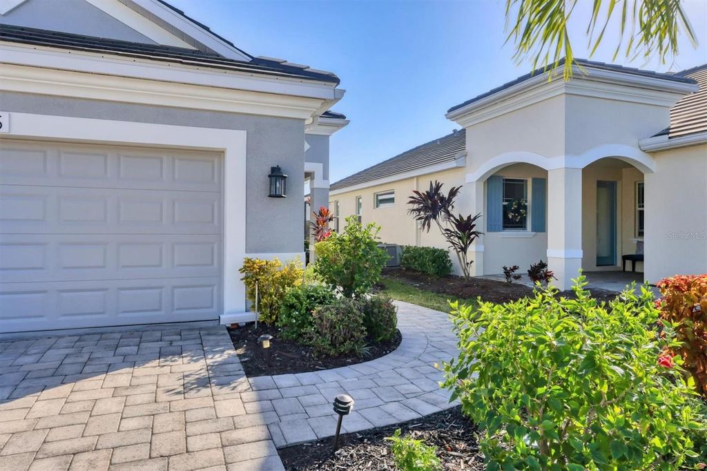 Photo of 7545 Alumni Trail, Sarasota, FL 34243 (MLS # A4675595)