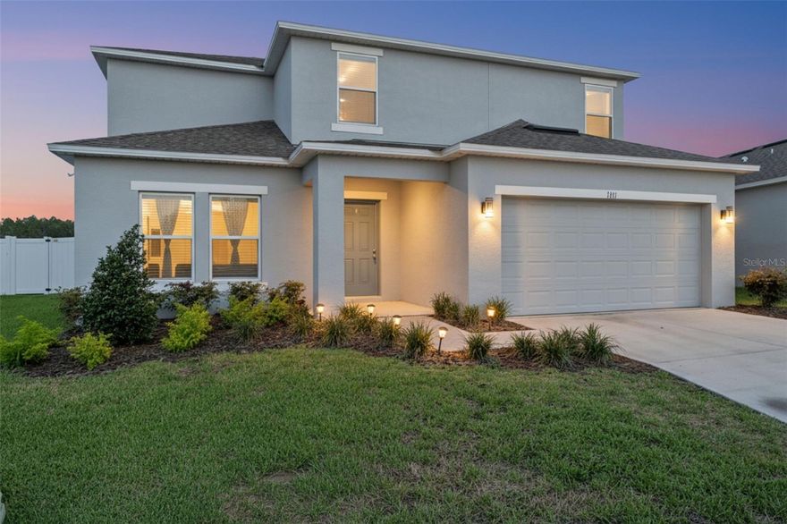 Welcome to the highly sought-after Azalea floorplan in Parkside at Cherry Lake, where comfort, functionality, and entertaining come together beautifully! This spacious two-story home offers an open-concept design featuring a large gathering room that seamlessly flows into the gourmet kitchen and casual dining area, creating the perfect space for hosting family and friends. The kitchen is complemented by extended tile flooring, window blinds, garage door opener, and access to the covered lanai overlooking the vinyl fenced backyard with endless potential to create your own private outdoor oasis.

A major highlight of this home is the full guest bedroom and bathroom conveniently located on the first floor, ideal for overnight guests or multigenerational living. The charming downstairs study with elegant double doors provides the perfect setup for a work-from-home office, library, or flex space.

Upstairs, you’ll find a spacious loft area where you can enjoy views of the magical Citrus Tower holiday light show during Christmas season right from the comfort of your home. The owner’s suite features a large walk-in closet, dual quartz vanities, oversized shower enclosure, additional linen storage, and a thoughtfully designed layout for everyday comfort. Three additional bedrooms, a hallway linen closet, and laundry room complete the second floor.

Located just minutes from the Florida Turnpike, shopping, dining, hospitals, schools, and entertainment, this home combines convenience with modern living. Even better, this property offers an assumable VA loan at an attractive 5.875 interest rate, presenting a rare opportunity for qualified buyers. Don’t miss your chance to own this beautiful home in one of Clermont’s growing communities!