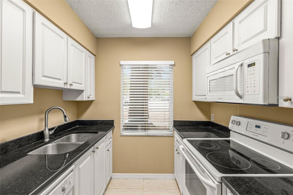 Photo of 7510 Presley Place #99-B, Tampa, FL 33617 (MLS # TB8494104)