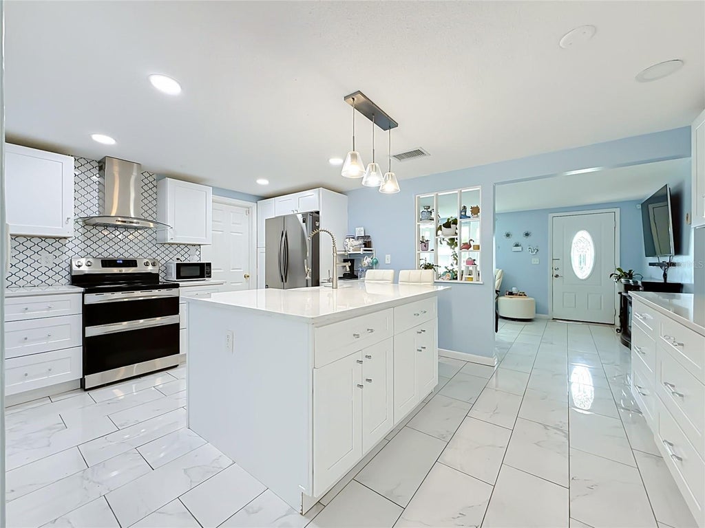 Photo of 1627 Dander Drive, Holiday, FL 34690 (MLS # TB8531441)