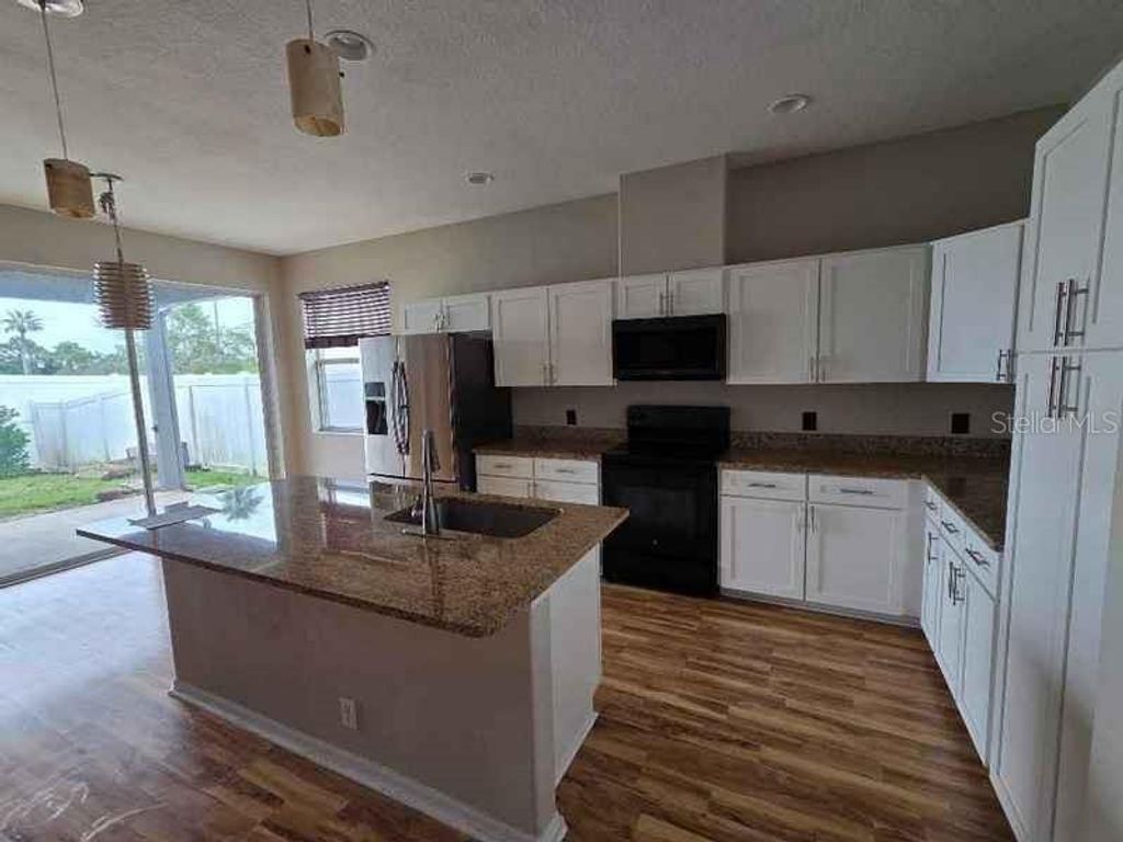 Photo of 14611 Potterton Circle, Hudson, FL 34667 (MLS # TB8431510)
