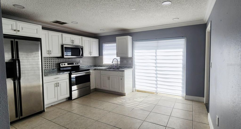 Photo of 7118 Jenner Avenue, New Port Richey, FL 34655 (MLS # TB8467033)