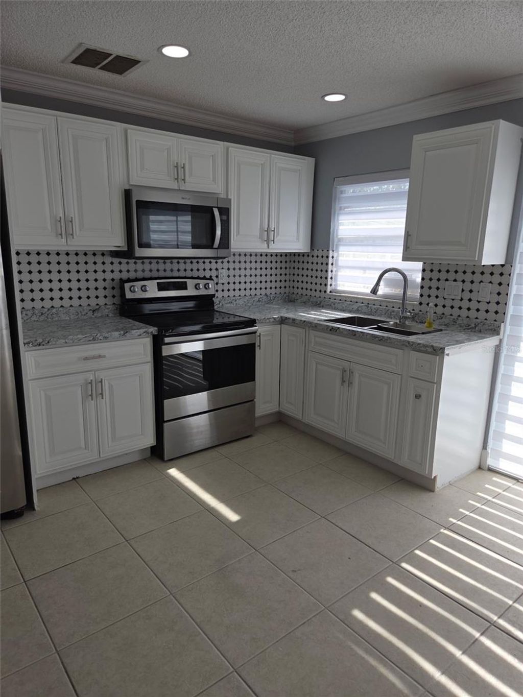 Photo of 7118 Jenner Avenue, New Port Richey, FL 34655 (MLS # TB8467033)