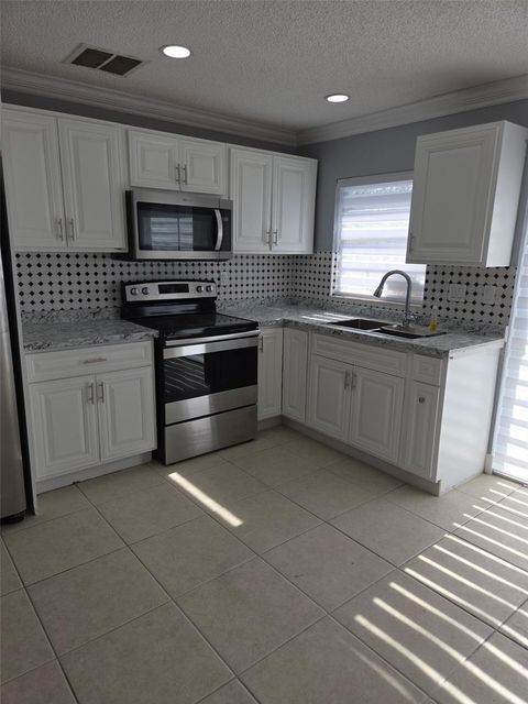 Photo of 7118 Jenner Avenue, New Port Richey, FL 34655 (MLS # TB8467033)