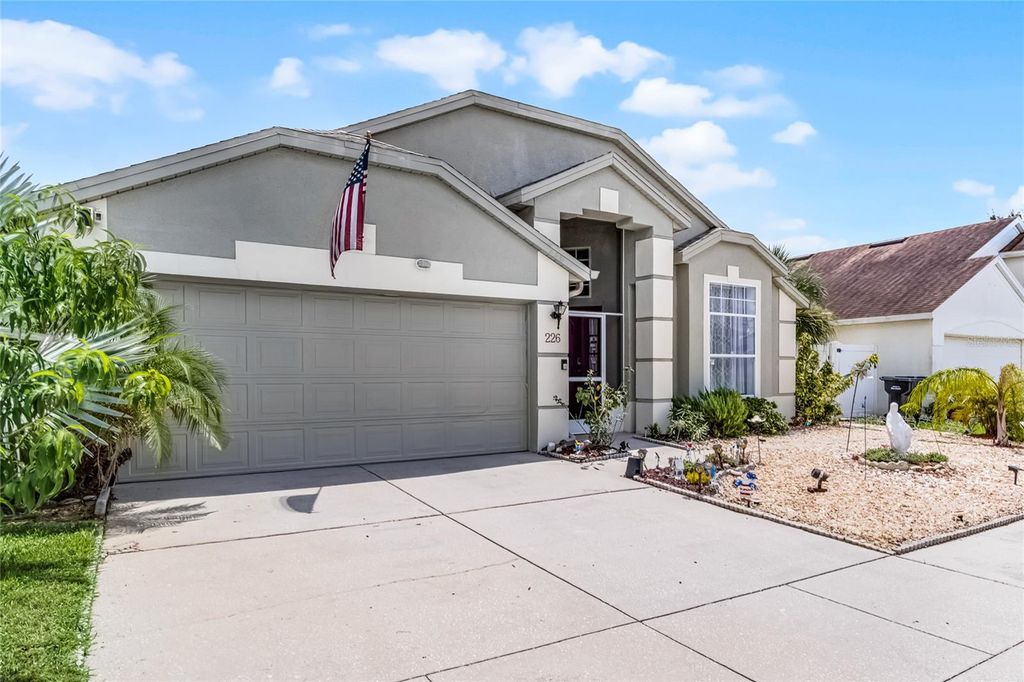 Photo of 226 Rochester Loop, Davenport, FL 33897 (MLS # O6332668)