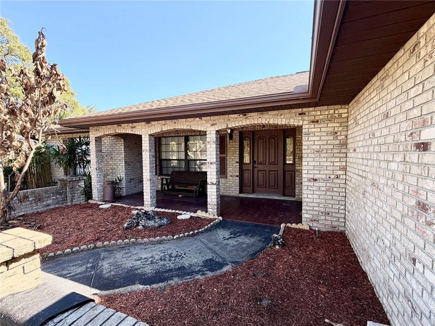 Stop scrolling — this is the rare Leesburg combo that sells fast. Fully renovated and truly move-in ready on a .32-acre corner lot with NO HOA, boat/RV parking, and just 0.3 miles from Mirror Lake—the perfect blend of space, freedom, and location.

Step up to a truly welcoming Florida façade where classic masonry meets rich architectural detail. A wide walkway bordered by natural stone accents and vibrant landscaping leads you to a spectacular arched brick portico that instantly commands attention—an entrance that sets the tone before you even step inside.

Inside, the home delivers a clean, cohesive modern finish from room to room: new modern tile flooring throughout, new cabinetry, granite countertops, new lighting, and fresh interior paint. The updates continue with new doors throughout, a brand-new laundry room, and a fully renovated primary (master) bathroom featuring a sleek, modern design built for comfort and everyday luxury.

The layout lives as well as it photographs. You’ll love the open split floor plan, designed so everyone can spread out while still feeling connected. The cozy stone fireplace anchors the living room—perfect for relaxed evenings, holiday gatherings, and effortless entertaining.

Then comes the Florida lifestyle payoff: the pool area is designed for real use with a covered lanai for shaded lounging and outdoor dining, plus a Florida room that gives you extra space to unwind, host, or enjoy the view rain or shine. And with a new pool pump and filter, weekends are for relaxing—not repairs. Even the garage is finished right with a brand-new epoxy coating—polished, durable, and ready for clean storage, hobbies, or a workshop setup.

And because the lot matters as much as the home, this .32-acre corner parcel delivers what most listings can’t: space, privacy, and flexibility—including room to park your boat or RV, with the freedom that comes from no HOA restrictions.

If you’ve been waiting for a home that’s turnkey, updated top-to-bottom, and built for how you actually live, this is it. Schedule your private showing today.