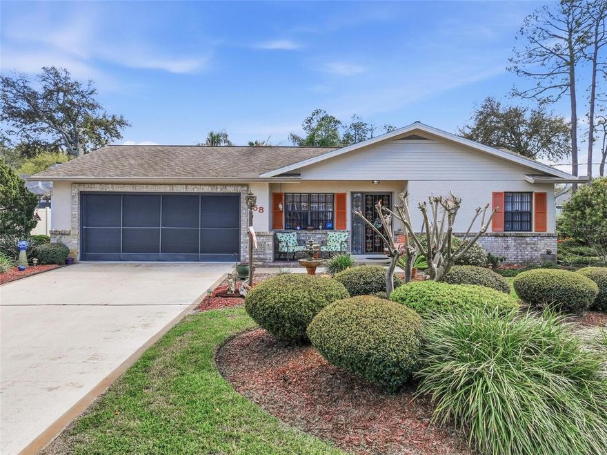 Welcome to 58 Wentworth Lane, a beautifully maintained 3-bedroom, 2-bathroom home located in the desirable Pine Lakes community of Palm Coast. This home features a sought-after split floor plan, offering both privacy and functionality. You’ll find beautiful tile flooring throughout the main living areas, with cozy carpet in the bedrooms. The kitchen is designed for both convenience and connection, featuring an eat-in counter space as well as a breakfast nook with sliding glass doors that lead out to the lush, private backyard. Enjoy peaceful mornings or relaxing evenings surrounded by mature landscaping and views of the bird feeder in your own serene outdoor retreat. The enclosed Florida room is filled with an abundance of natural light thanks to its newer windows, creating a bright and inviting space perfect for relaxing or entertaining year-round. Just beyond the Florida room, a spacious concrete slab offers endless possibilities—screen it in, build a pool, or create your dream outdoor entertaining area. This home is priced to sell and is a fantastic opportunity to enjoy the Florida lifestyle in a beautiful, established neighborhood with no HOA!