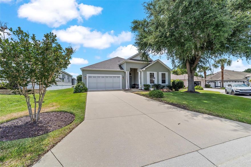 Located on a quiet cul-de-sac in the Village of Sunset Hills, this RARELY AVAILABLE CARTON FLOOR PLAN offers the perfect blend of space, privacy, and PRIME CENTRAL LOCATION—just minutes from Lake Sumter Landing. From the moment you arrive, the MATURE, MANICURED LANDSCAPING sets the tone, leading into a LARGE OPEN FOYER that flows seamlessly into the main living area—ideal for entertaining and everyday living.***

This home features 10-FOOT CEILINGS THROUGHOUT and LUXURY VINYL FLOORING THROUGHOUT, enhanced by TRAY CEILINGS, ROUNDED DRYWALL CORNERS, and TALL WINDOWS AND DOORS that flood the home with natural light. The open-concept kitchen is both functional and stylish with QUARTZ COUNTERTOPS, TILE BACKSPLASH, AMPLE WHITE CABINETRY, and a BREAKFAST BAR, along with UPDATED APPLIANCES INCLUDING A GAS RANGE—perfect for those who love to cook.***

The SPACIOUS PRIMARY SUITE offers abundant natural light, while the en-suite bath includes DUAL VANITIES, GLASS-ENCLOSED SHOWER, and a WALK-IN CLOSET. Two additional bedrooms provide flexibility for guests, a home office, or hobby space, and the INTERIOR LAUNDRY ROOM WITH EXTRA STORAGE adds everyday convenience.***

STANDOUT FEATURE — THE LANAI: The oversized screen-enclosed lanai is truly one-of-a-kind, designed with EXTRA-TALL FRAMING that creates a more open, airy feel with EXCEPTIONAL AIRFLOW—making it a true PRIVATE OUTDOOR OASIS perfect for relaxing or entertaining year-round. One side of the lanai also features a WEATHER-PROTECTIVE SCREEN ENCLOSURE, helping shield the space and outdoor furniture from rain while still maintaining the open-air feel and breeze The Villages lifestyle is known for. The OVERSIZED LOT also provides room to add a pool if desired.***

Additional highlights include a 2-CAR GARAGE WITH ATTIC STAIRS AND BUILT-IN CABINETRY and a WHOLE-HOUSE WATER SOFTENER SYSTEM.***

LOCATION MATTERS: Approximately 0.5–1 MILE to nearby recreation centers such as Hibiscus Recreation Center offering POOLS, TENNIS & PICKLEBALL; about 1–2 MILES to golf at Bacall Executive Golf Course and Mallory Hill Country Club; roughly 2–2.5 MILES to Lake Sumter Landing; and approximately 6–7 MILES to Brownwood Paddock Square—placing you right in the heart of everything The Villages has to offer.***

BOND BALANCE: $5,361 *** AD VALOREM TAX: $3,591 *** NON-AD VALOREM TAX: $1,627 *** AMENITY FEE: $204/MO
ROOF: 2020
