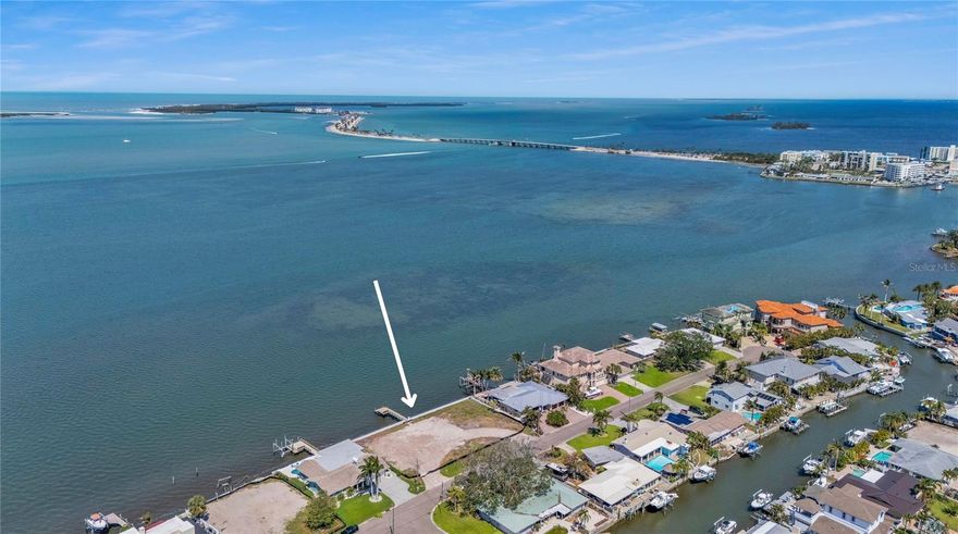 *Seller Accepting Back-Ups.* An extraordinary opportunity awaits to build your dream home on this expansive, west-facing double lot with 160 feet of prime Gulf of America frontage. Situated in one of Dunedin's most coveted locations, this property offers an unparalleled canvas for your vision. You have the freedom to select your architect and builder to craft a custom waterfront residence that perfectly complements the stunning water views. This is one of the last remaining double lots directly on the GULF in the heart of Dunedin. A new dock was completed in April 2024, adding a value and convenience for boating enthusiasts. Dunedin is a golf-cart-friendly community, offering easy access to the greater Tampa Bay, including the Tampa International Airport. Dunedin is renowned for it charming, progressive atmosphere, featuring a vibrant downtown with award-winning restaurants, craft breweries, and a thriving arts scene. The city is home to one of the finest municipal marinas on Florida's West Coast, offering safe harbor for sail and powerboats with convenient dockside amenities. Explore the natural beauty of Honeymoon and Caladesi Islands, where you can enjoy windsurfing, sailing, kayaking, paddleboarding, fishing, and jet skiing or simple unwind on our white sandy beaches. Don't miss this rare chance to own a slice of paradise on the Gulf of America.