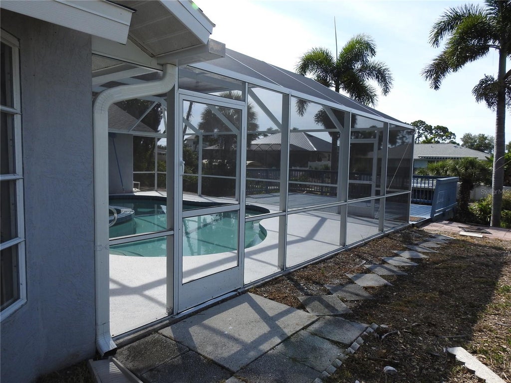 Photo of 2132 Pennsylvania Avenue, Englewood, FL 34224 (MLS # C7527086)