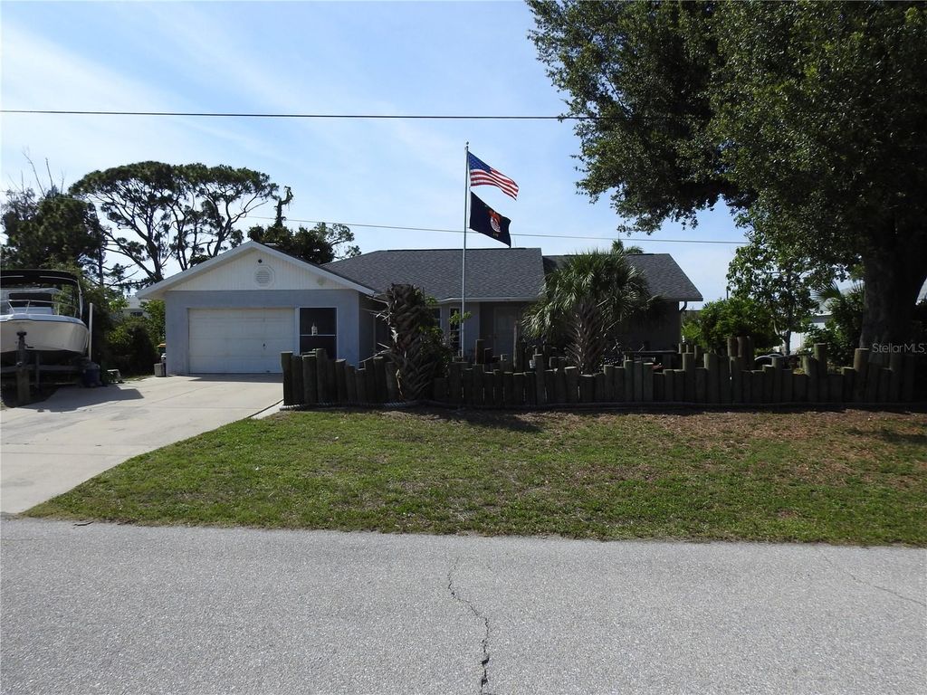Photo of 2132 Pennsylvania Avenue, Englewood, FL 34224 (MLS # C7527086)