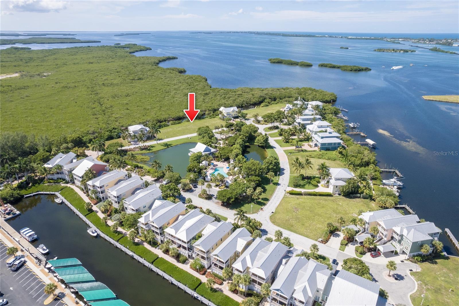 Prime Waterfront Lot with Direct Access to the Intercoastal & Gulf of Mexico. If you're a boater, this is the perfect spot to build your dream home! Just 1 minute from the Intercoastal and a short ride to the Boca Grande Causeway and the Gulf of Mexico, this canal-front lot offers unbeatable convenience. Located in the prestigious, gated Anglers Club community, you'll enjoy southern exposure and breathtaking views of protected preservation land. This rare find is nestled among luxury homes and provides the ideal canvas to create your own waterfront masterpiece. Community amenities include a heated lagoon-style pool, clubhouse, fire pit, and a dock with water and electric for your boat. Several marinas are nearby, and you'll be just minutes from top-tier golf courses like the Tom Fazio Signature Coral Creek Club. Living here means easy access to pristine beaches like Boca Grande, Stump Pass, and Englewood. With endless opportunities for boating and fishing right at your doorstep, this is your chance to embrace the ultimate coastal lifestyle. Don’t miss this once-in-a-lifetime opportunity to own a piece of paradise!
