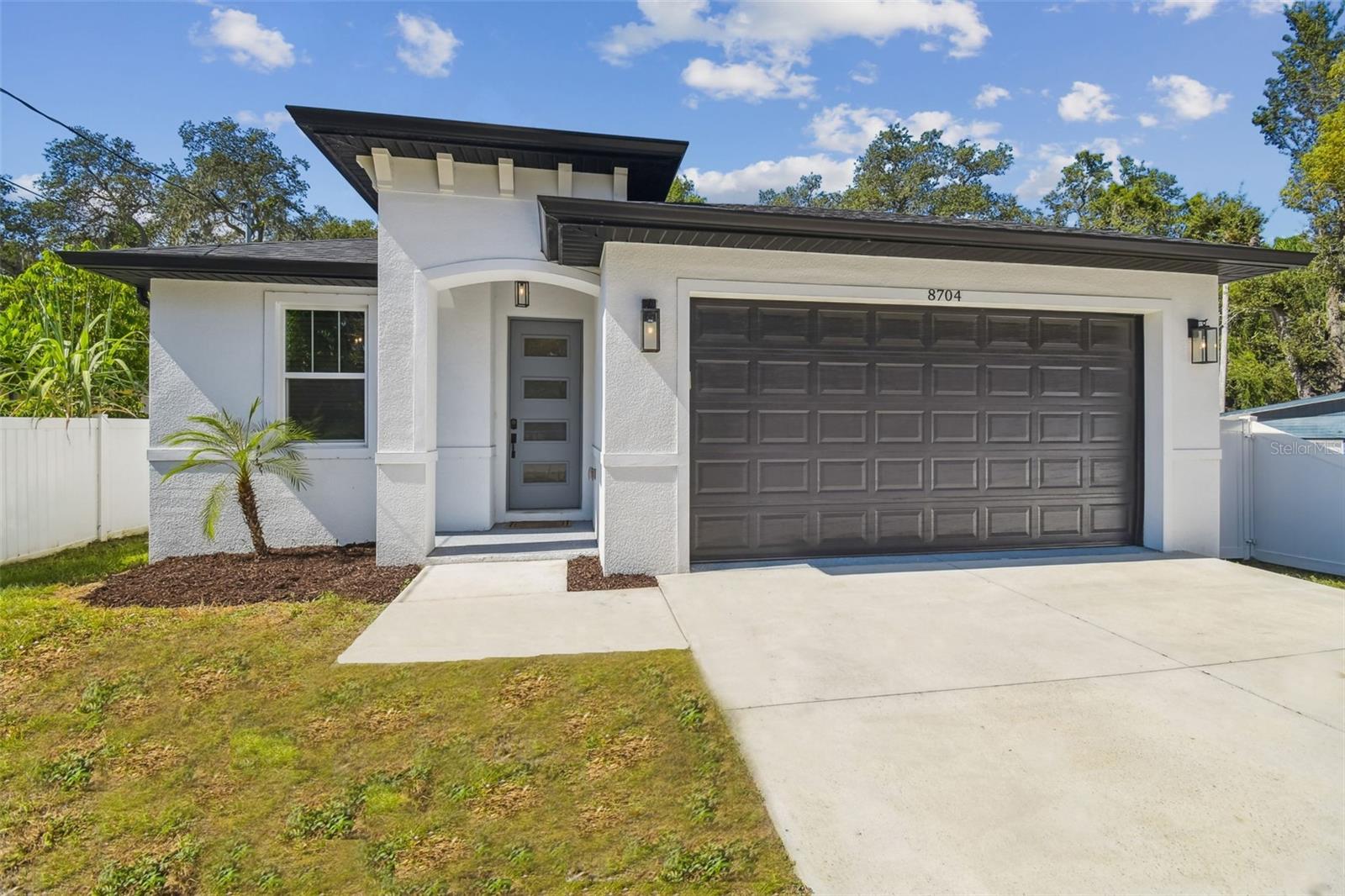 Stunning 3 bedroom, 2 bathroom home built in 2020! Loads of upgrades and custom touches. High ceilings throughout! Gorgeous marble looking tile throughout the home. Kitchen has lots of cabinet storage and countertop space. Separate dining area next to the kitchen. Spacious living room can accommodate large sectional sofa and more. Open floor plan is great for entertaining. Master suite features tray ceilings, two closets and a gorgeous master bathroom with a large shower and dual sink vanity. Laundry room has a side-by-side washer and dryer with extra storage. Two car garage has epoxy coated floors. Covered back patio overlooks huge backyard with vinyl fencing. This won’t last long, schedule a private tour today!