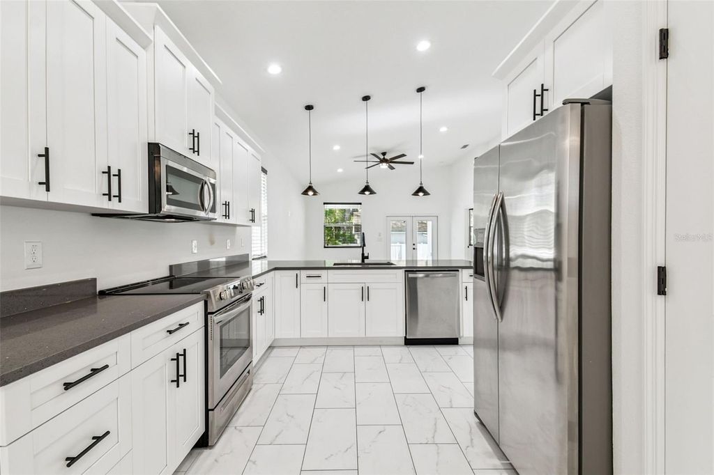 Photo of 8704 N Otis Avenue, Tampa, FL 33604 (MLS # TB8440795)