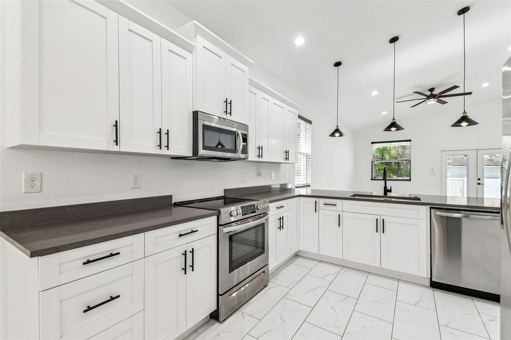 Photo of 8704 N Otis Avenue, Tampa, FL 33604 (MLS # TB8440795)
