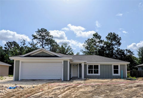 Photo of 8943 N Trojan Drive S, Citrus Springs, FL 34434 (MLS # O6430143)
