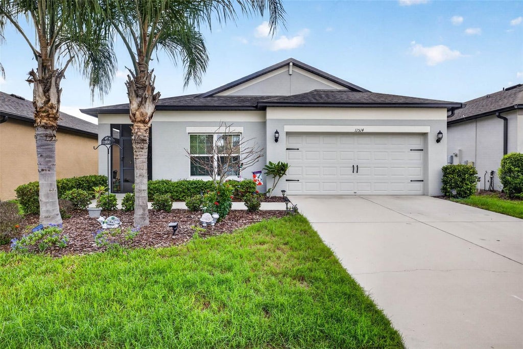 Photo of 11514 Leland Groves Drive, Riverview, FL 33579 (MLS # TB8522848)