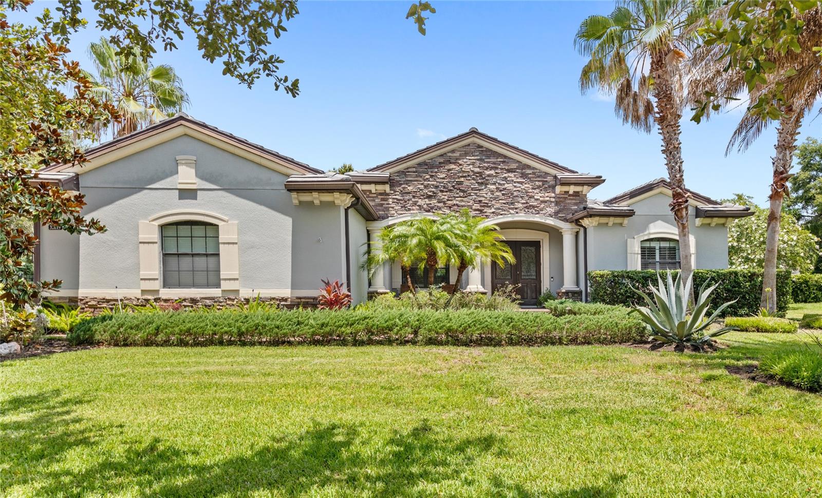 Under contract-accepting backup offers. Welcome to this stunning 4-bedroom, 3-bathroom home with a dedicated private office, positioned on an oversized half-acre homesite in the highly sought-after gated community of RedTail. As you enter, you’ll be greeted by a grand foyer featuring 10 foot ceilings, plantation shutters, crown molding, and custom decorative wood accents. The single story open-concept layout includes a formal dining room, a spacious living room, and a family room with multi-sliding glass doors that lead to a large covered, screened-in lanai. The open concept kitchen features granite countertops, stainless steel appliances, including a built-in oven, new cabinet-faced dishwasher, and a spacious pantry. A large breakfast bar and eat-in nook seamlessly connect the kitchen to the family room. The primary suite includes an additional sitting area, private lanai access, dual closets (including a large walk-in), and an ensuite with soaking tub, walk-in shower, dual vanities, and a linen closet. The 3-way split floor plan provides spacious guest bedrooms and a dedicated home office. It is functional and private. The 2 guest bedrooms are split with a full guest bathroom in between, and the 4th guest bedroom is situated next to its own full bathroom. The large laundry room offers a sink, and access to the 3-car garage. Once you go outside, you are welcomed to the massive backyard, beautifully maintained with lush grass, mature trees, and ample room for play, entertaining, or even a pool. The long paver driveway leads to a double gate access on the side of the home into the backyard. Living in RedTail also offers amenities, like: golf, clay tennis courts, a clubhouse, community resort-style pool and fitness center. Located in Sorrento, you’re just minutes from the 429 Expressway, 15 minutes from Downtown Mount Dora, and within easy reach of Orlando, Disney, MCO and the beaches. Sorrento is also only minutes to Lake Mary thanks to the Wekiva Parkway extension. Call today to schedule your private tour.