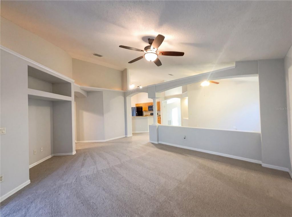 Photo of 1148 Greenley Avenue, Groveland, FL 34736 (MLS # O6390362)