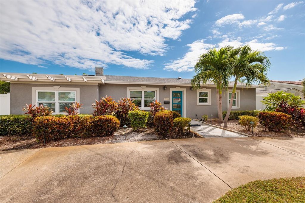 Photo of 9101 Sun Isle Drive NE, St Petersburg, FL 33702 (MLS # TB8444181)