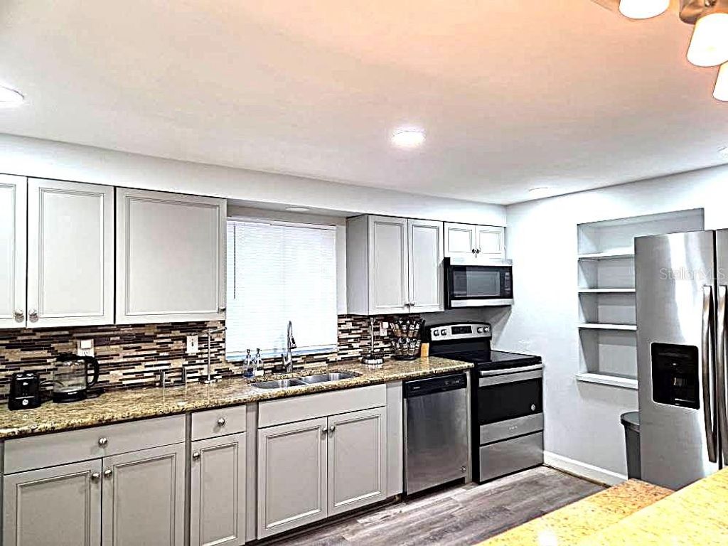 Photo of 6886 49th Avenue N, St Petersburg, FL 33709 (MLS # TB8445128)