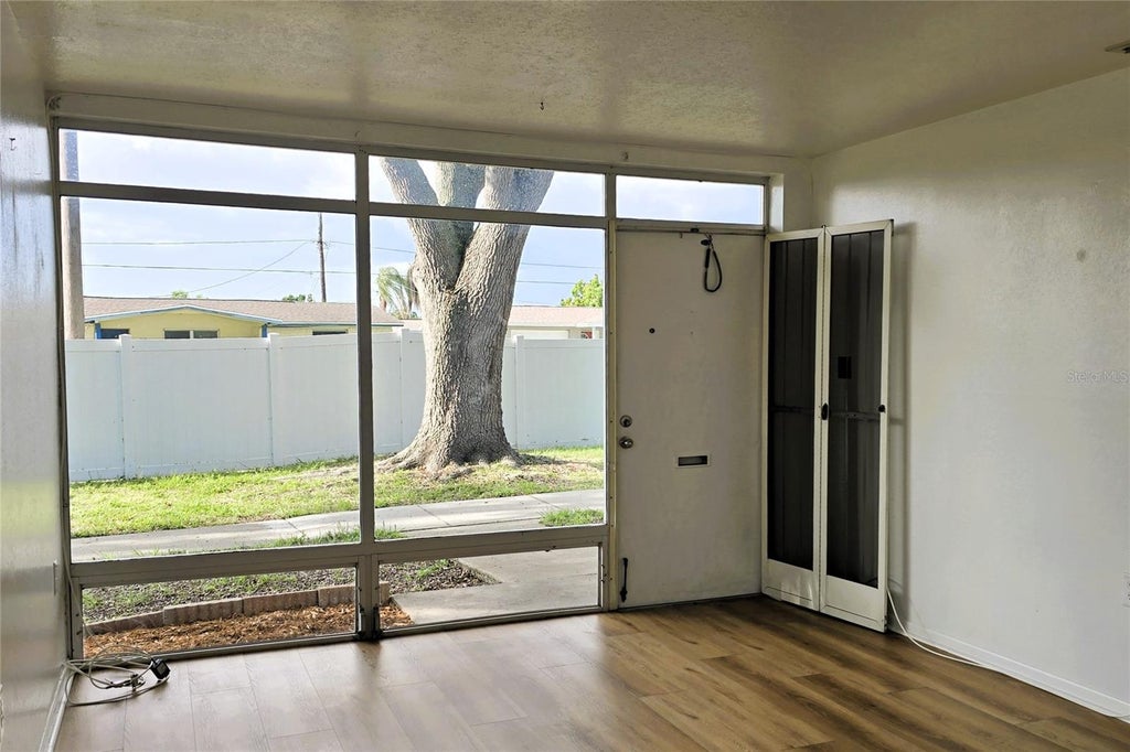 Photo of 4365 Tahitian Gardens Circle #E, Holiday, FL 34691 (MLS # TB8557631)