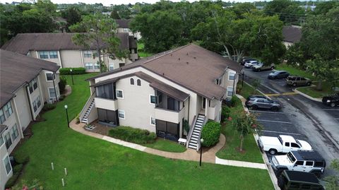 Photo of 3019 Antique Oaks Circle #124, Winter Park, FL 32792 (MLS # O6337083)