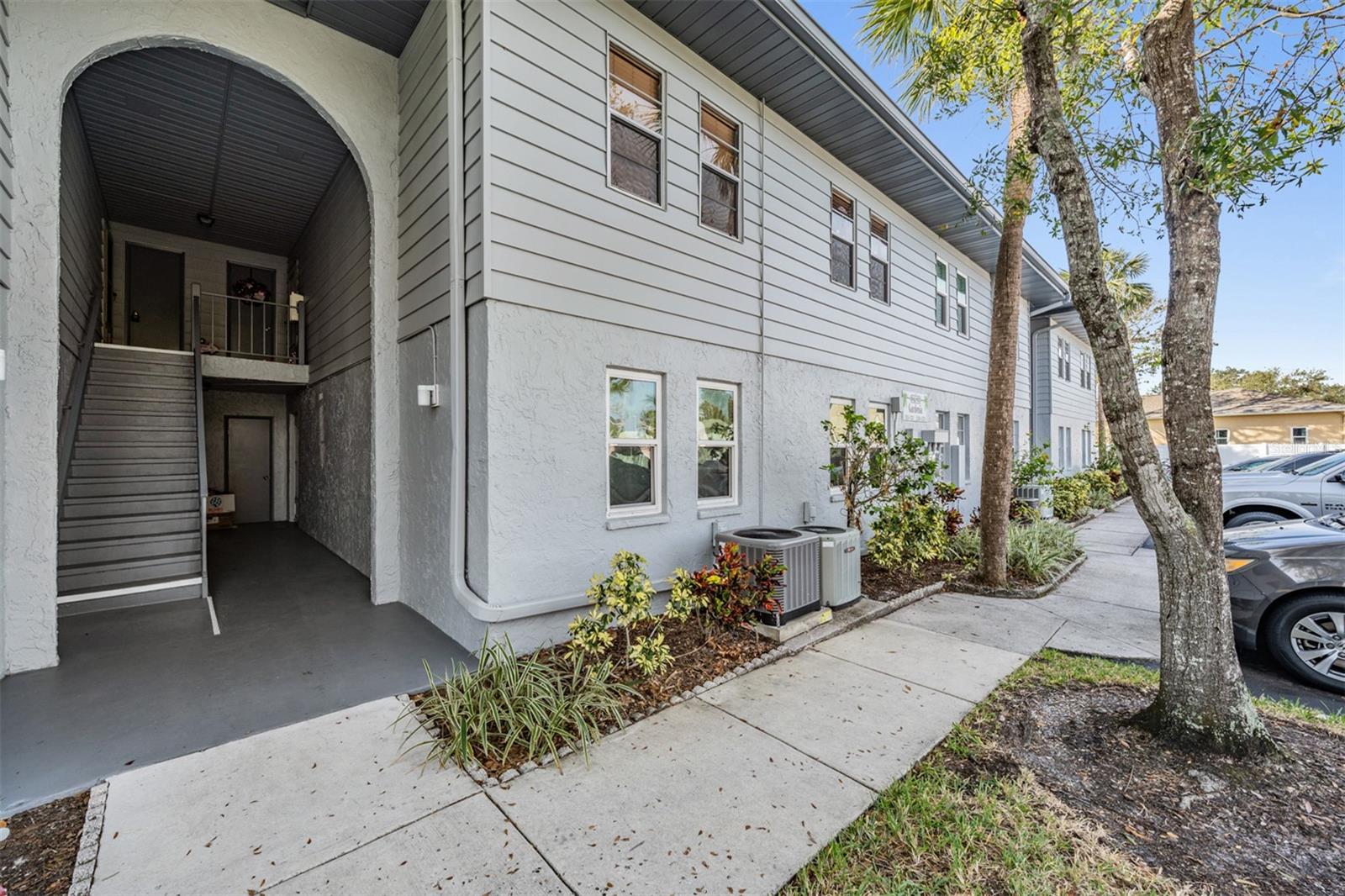 Nestled in the charming Sandalwood Condo Community in Pinellas Park, this bright corner unit offers two bedrooms—each with generous walk-in closets—and two full bathrooms. The split-bedroom layout creates a smart balance between shared and private spaces, while ample sunlight keeps the interior feeling lively. There’s a screened-in balcony that extends the living area, perfect for sipping morning coffee or enjoying the breeze.
The clubhouse at Sandalwood is a central amenity, featuring a full kitchen, cozy lounge seating, a sparkling pool, and a heated spa—ideal for both entertaining and unwinding. Well-manicured landscaping and pristine grounds add to a vibrant yet peaceful atmosphere, capturing the community’s welcoming spirit.
All daily conveniences are just across US-19: Walmart, Sam’s Club, Ross, Walgreens, and the Northgate Shopping Center. Outdoor recreation is easy with nearby John Chestnut?Sr. Park & Boat Ramp, and beautiful Sand Key and Clearwater Beaches just a short drive away. Easy access to I-275 and US-19 ensures the airport and local venues are within comfortable reach—making both day-to-day life and weekend adventures effortlessly manageable.
Comfortable, convenient, and community-minded—this condo offers a fresh, welcoming take on Florida living.