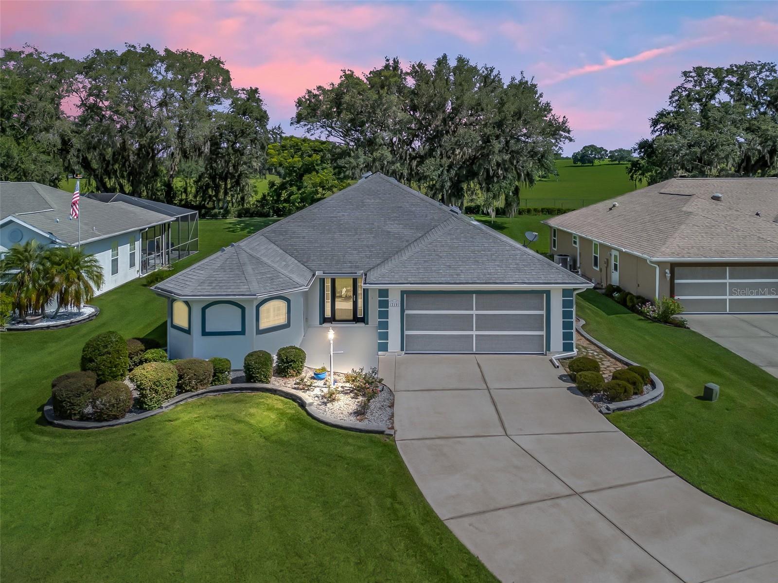 One or more photo(s) has been virtually staged. PREPARE TO BE SURPRISED!! This home has amazing features for the price!!!! THE MAPLE MODEL from THE WOODLAND COLLECTION is now available in a country like location, but in a pvt. gated golf community!
Stonecrest is a private, gated community w/ 24 hour controlled access. Updates to the home include: 2025- 4 ton HVAC , 2018-electric
updated with transfer station for portable generator, under and over kit. cabinet lighting, on demand water heater, water softener, hide away screen on utility dr. in garage, ele. screen on main garage door, newer S/S appliances, disposal button on top of granite counter, duel electric convection range, laundry sink in garage, no bathtubs in this home, windows cleaned inside and out, exterior lighting, Pvt. mailbox, recent ext. paint, new LVP floors in bedrooms, new smoke detectors, two temp controlled attic fans, gutters, elec. on lanai for possible hot tub, roll down shades on Lanai. Outdoor key pad with duel codes for elec. garage door and screen opener that work on the same track. See agent for help.
Open floor plan, with a split bedroom suite offering a pocket door for guests privacy. Perfect location in Meadows II, with a 9x14 covered lanai and a 9x14 birdcage overlooking the fields, where the cows graze peacefully under the majestic oak trees and open fields. Covered front porch, 5x9, entry offers a Storm door and a leaded glass door with two sides lites leading to the large foyer with a front coat closet, a large laundry rm. with lots of cabinets and shelving, Plantation Shutters throughout, kitchen with granite counters, a large wall pantry, microwave vents to the outside, and a large one level island with space for eating.
Primary suite offers a tray ceiling, 2 walk in closets, a walk in shower w/ a bench, a water closet, a linen closet, and a large area with
separate sink vanities and glass block windows for added natural light. Linen closet in 2nd ba. with a large walk in shower.
Discover Your New Lifestyle at Stonecrest! Today could be the BEST DAY OF THE REST OF YOUR LIFE! If you're searching for a home in a
private, gated, golf community, look no further you've found your dream lifestyle at Stonecrest.
Nestled in the heart of No. Central Florida, Stonecrest is a deed-restricted, active 55+ golf community that offers the perfect blend of luxury, convenience, and recreation. Imagine waking up every morning in a community designed for those who cherish an active lifestyle, where golf cart access takes you to nearby shopping and more. Let me know if you need a golf cart to go with your new home.