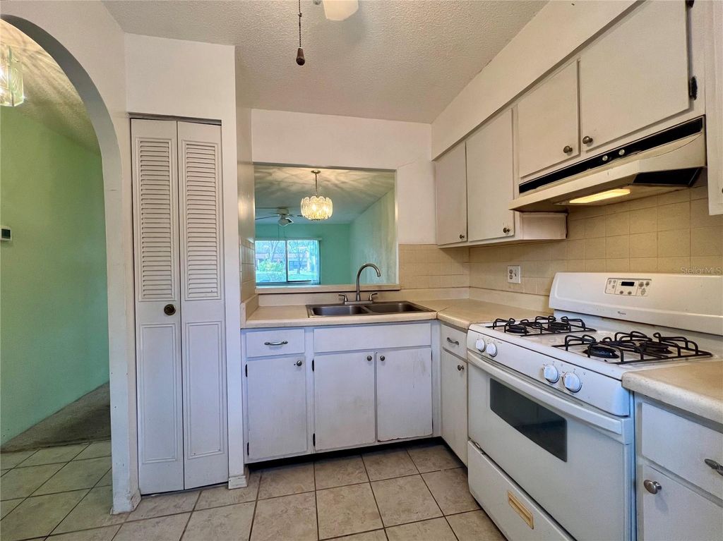 Photo of 1410 Arrowhead Circle W, Clearwater, FL 33759 (MLS # TB8492196)