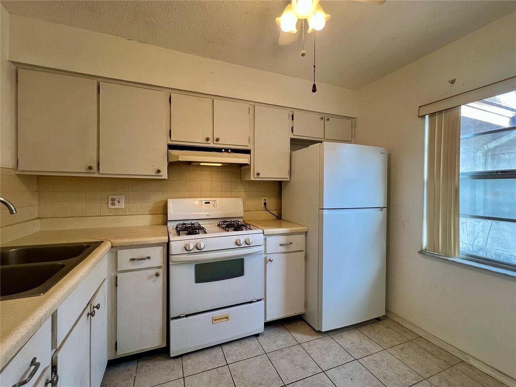 Photo of 1410 Arrowhead Circle W, Clearwater, FL 33759 (MLS # TB8492196)