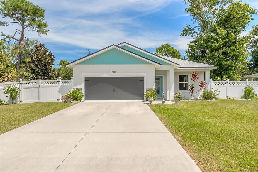 Beautiful Florida Shores home built in 2021 with NO HOA on an oversized lot!! Open concept floor plan with tons of upgrades including a motorized garage screen, new fence, interior doors, hurricane shutters, and luxury vinyl plank flooring to name a few. The eat-in kitchen features gorgeous quartz countertops, white shaker cabinetry, SS appliance package, breakfast bar, center island, large walk in pantry, and a gas stove. The primary ensuite is spacious and thoughtful with his and hers walk-in closets, dual sink quartz vanity, and floor to ceiling tile in the shower. Sliding glass doors lead out to the covered back porch and Large private backyard. The current owner recently added the most spectacular ''She Shed'' equipped with air conditioning that can be used as a private getaway,
art studio, or play house! All sizes are approximate. All information deemed accurate but cannot be guaranteed. Call for your private showing today! ;Water: City