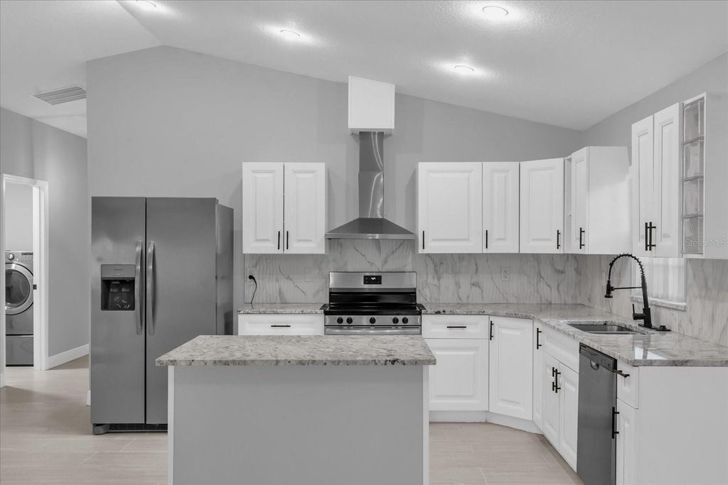 Photo of 319 Avenue A NE, Winter Haven, FL 33881 (MLS # O6397767)